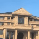 中卫黄金麻别墅外墙干挂石材效果示例