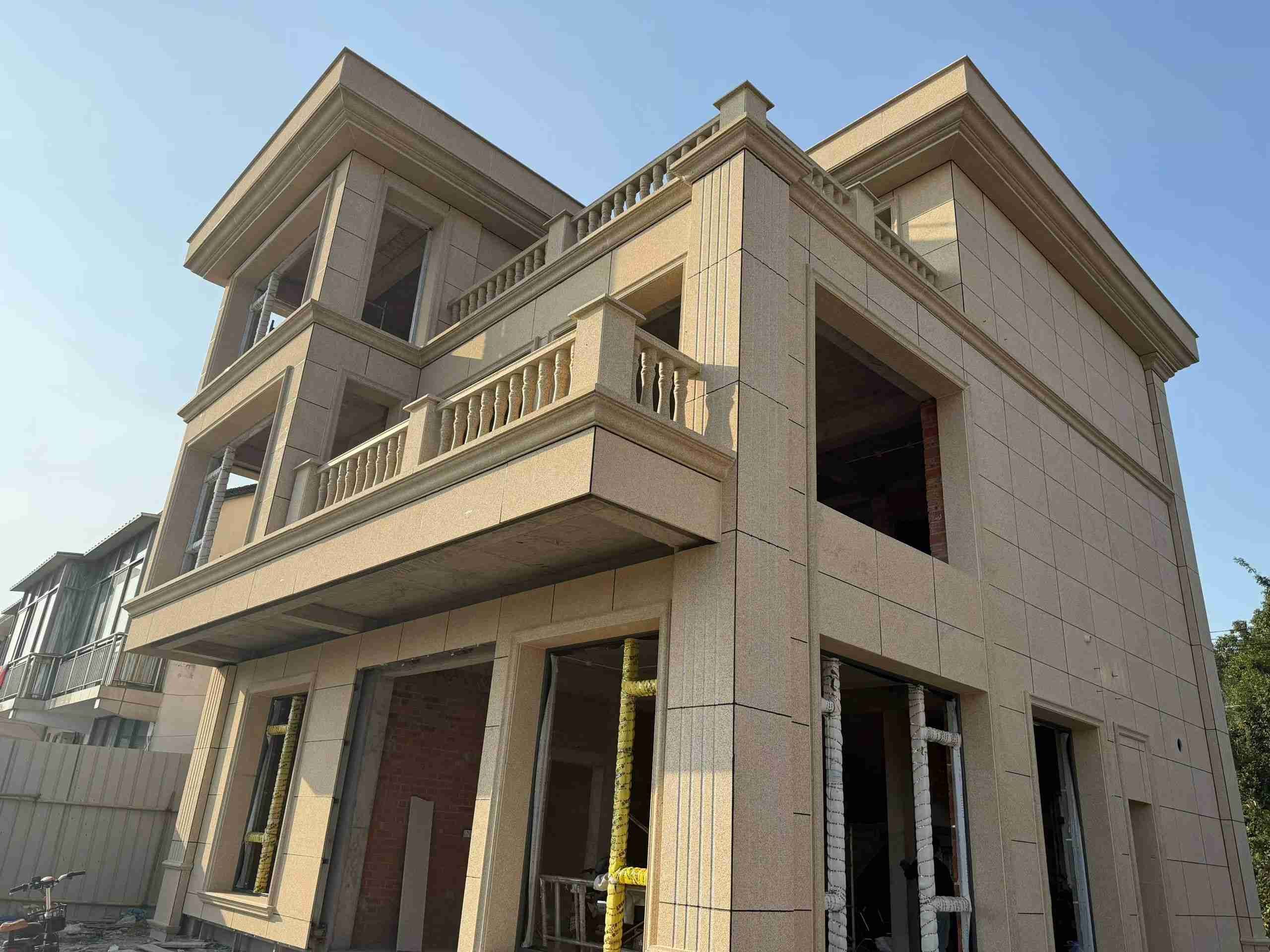 中卫 黄金麻花岗岩石材荔枝面外墙干挂效果展示